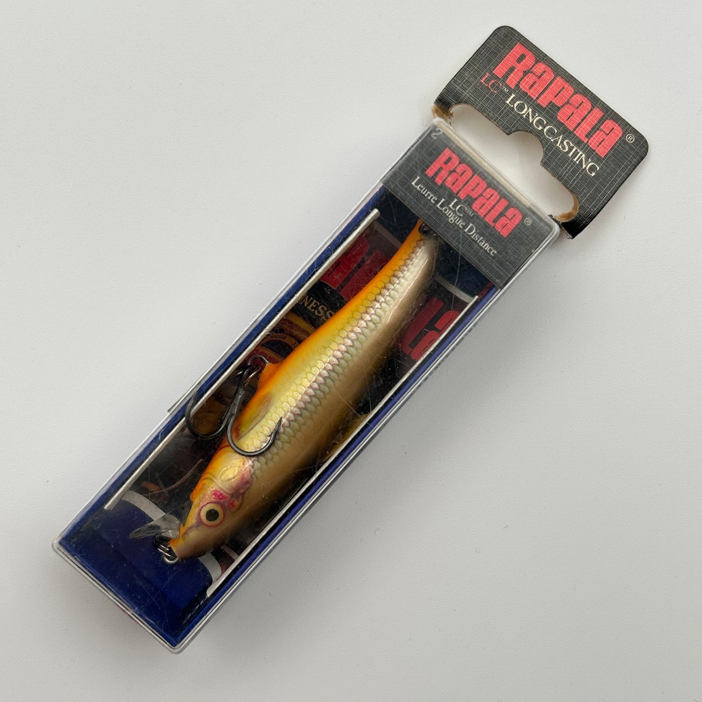 Rapala Long Casting LC-8 Wobbler / Kunstköder mit Drillingshaken Redtail Chub 7g